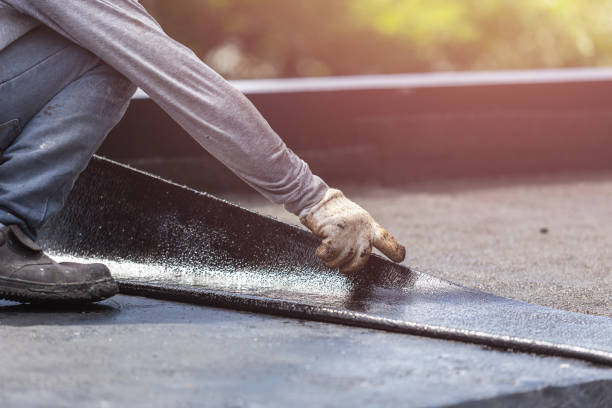 Professional Basement Waterproofing technician working in Laura, OH